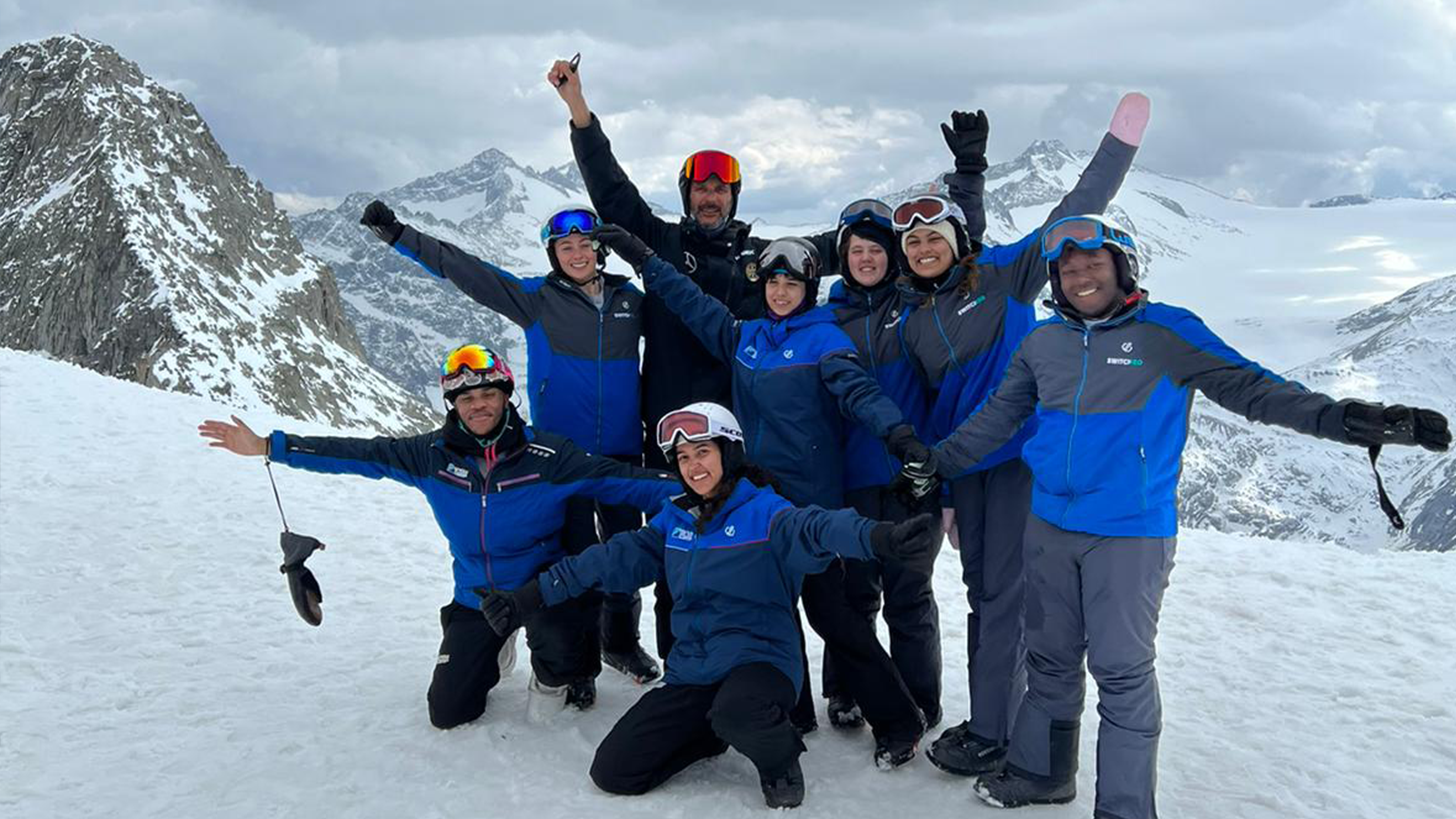 Hafsah and group against panoramic Passo Tonale background